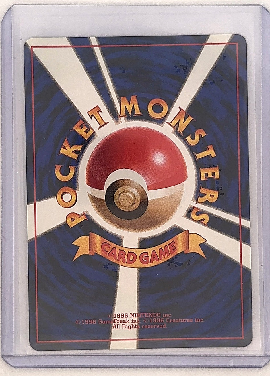 Rocket's Zapdos #015/132 — back