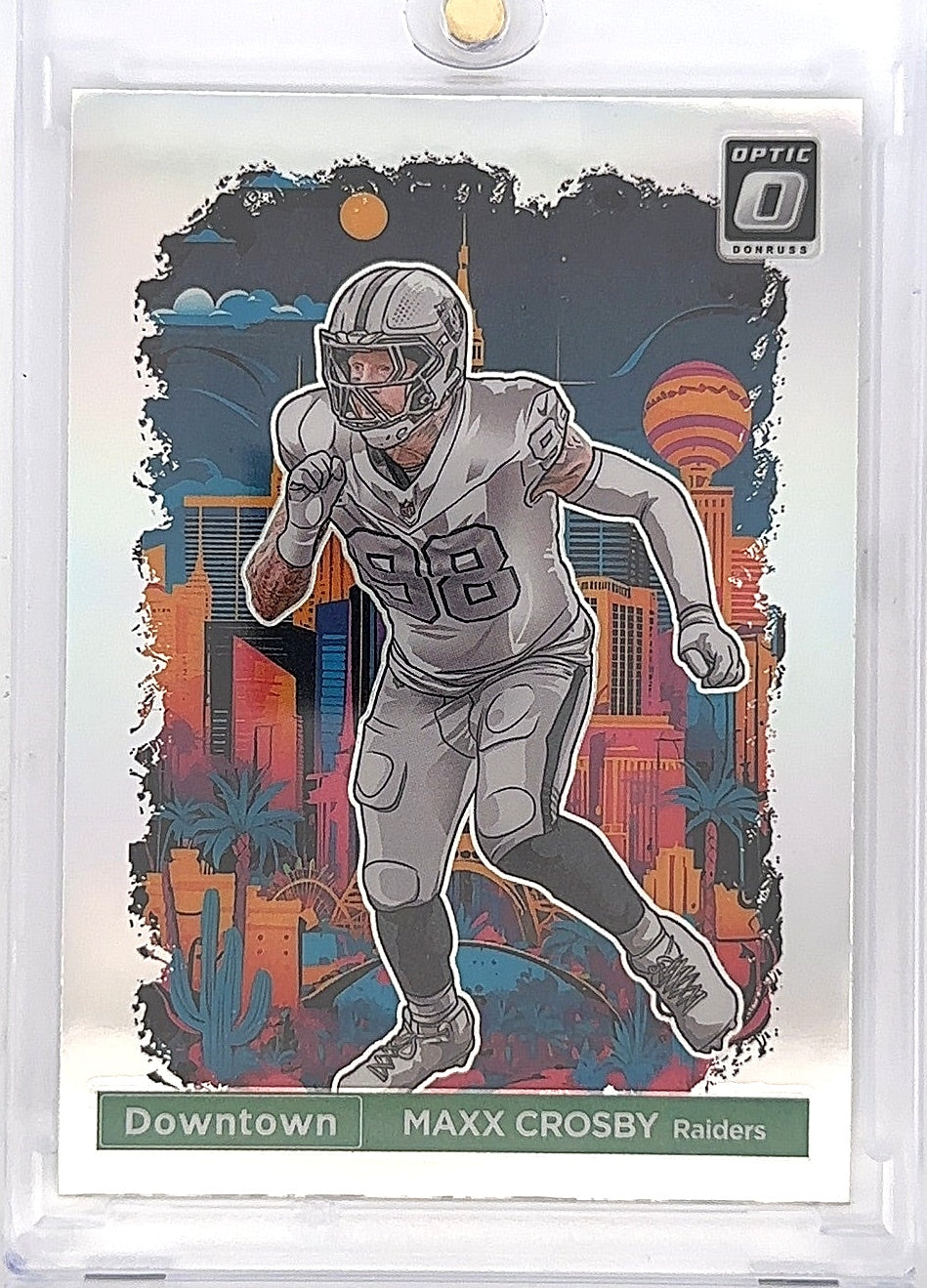 2024 Panini Donruss Optic Downtown Maxx Crosby #23 — front