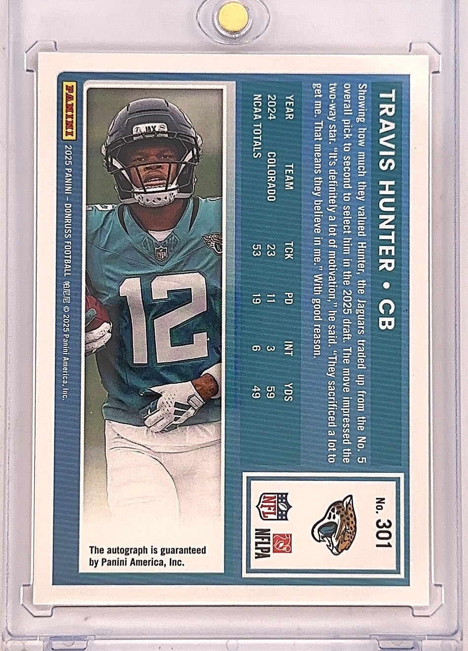 2025 Panini Donruss Travis Hunter [Orange Autograph] #301 — back