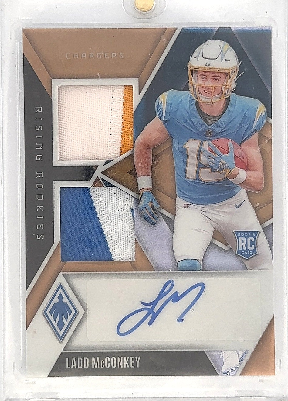 2024 Panini Phoenix Rising Rookies Dual Patch Autograph Ladd McConkey /33 #RRDP-LMY — front